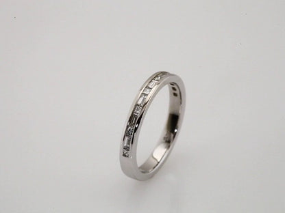 3/8 CTW Natural Diamond Channel Set Anniversary Band
