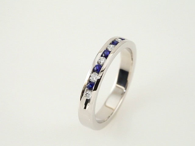 Platinum Natural Blue Sapphire & 1/10 CTW Natural Diamond Anniversary Band