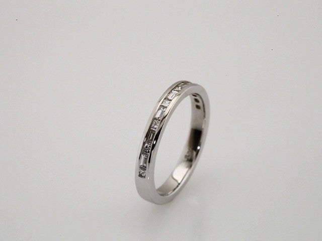 3/8 CTW Natural Diamond Channel Set Anniversary Band